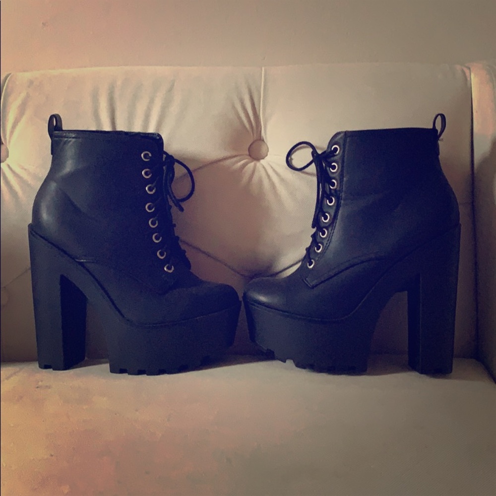 NEW black booties. Only worn once
